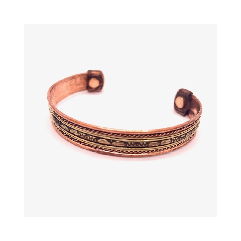 Bracelet de cuivre avec aimants et motifs en relief